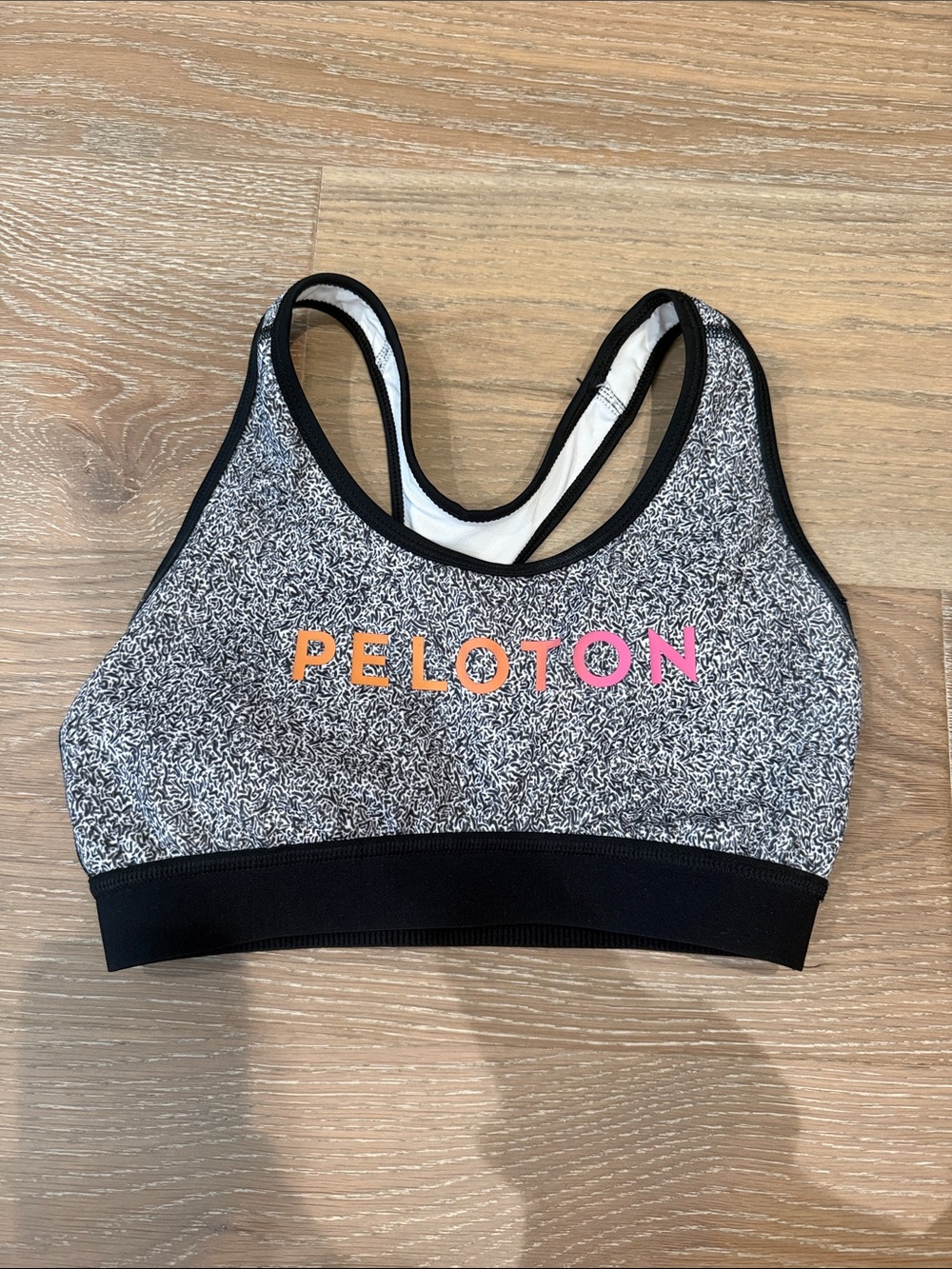 Peloton Women's Speckled Gray & Black Sports Bra with Multicolor Logo